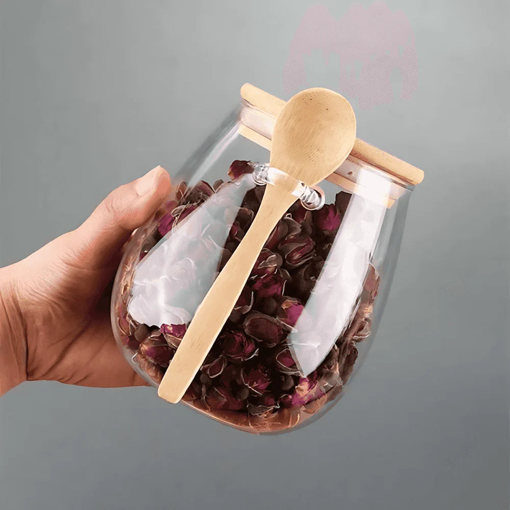 Glass food storage jar with bamboo spoon