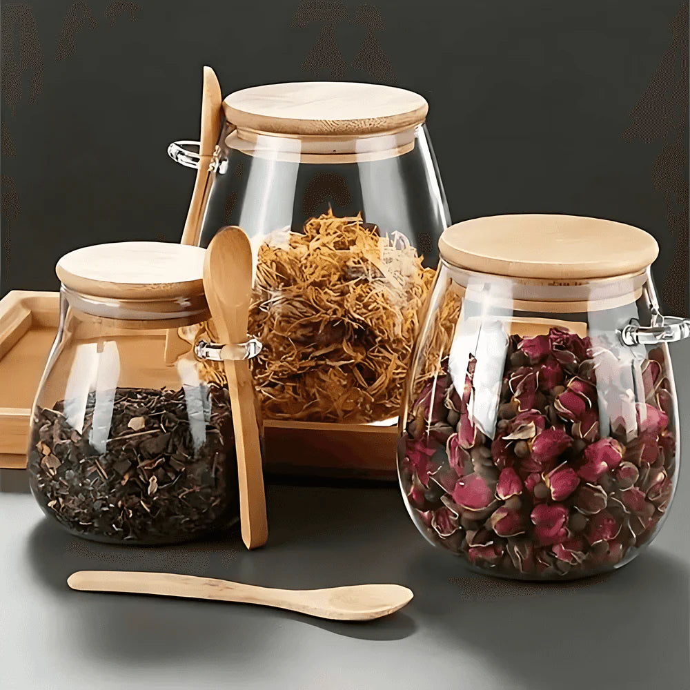 Glass food storage jar with bamboo spoon and airtight seal
