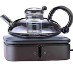 Microwave-safe Sereno teapot heating herbal tea in modern kitchen setting