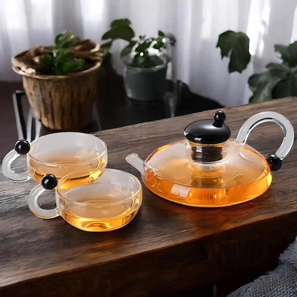 Sereno glass teapot set next to electric hot plate – bundle offer display